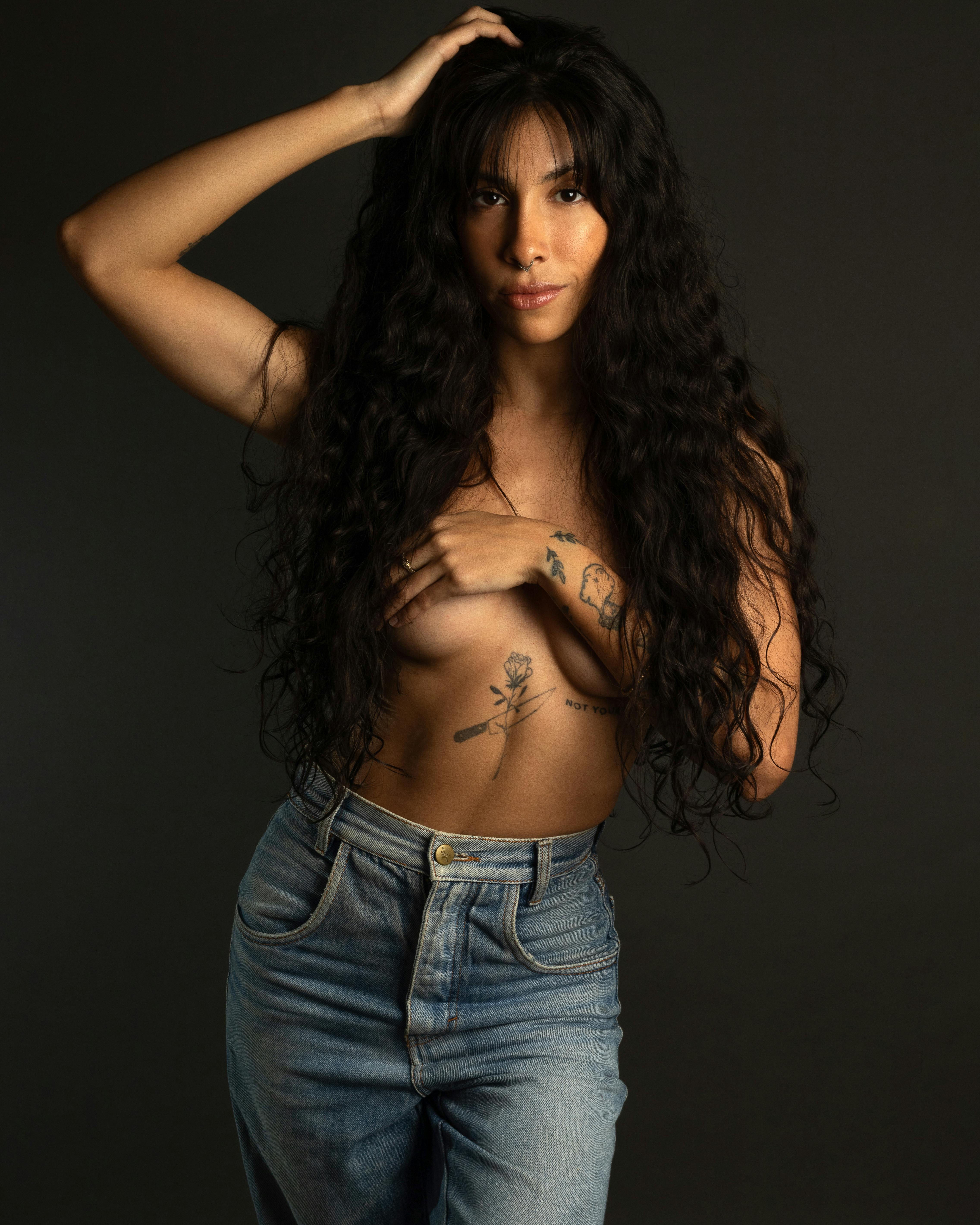 Artistic photo related to breast play.